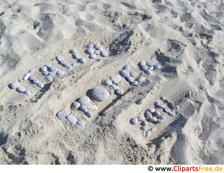 Buchstaben auf dem Sand im Urlaub Foto